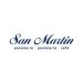 Logotipo de las panaderias guatemaltecas conocidas como San Martín, son letras estilizadas de color azul